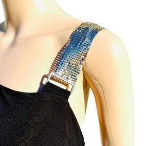 Black jumpsuit with asymmetrical neckline, half sleeve w/slit, metal strap